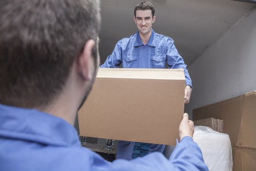 Stockwell Storage team handling separated recyclable materials in a sustainable storage setting