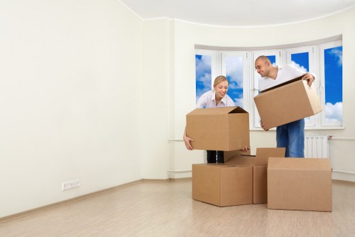 Professional removals team handling boxes and furniture in Stockwell