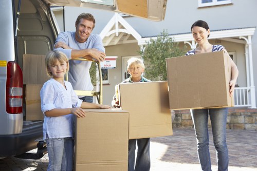 Professional house removals planning in Stockwell with moving boxes and a removal van
