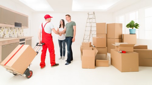 Organized storage space with labeled boxes and household belongings